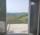 Donja kuća s dvorištem i voćnjakom- (prodaja)