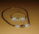 ZENSKA OGRLICA SA NARUKVICOM Pozlata